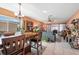 Open-concept living room with tile flooring, dining area, and natural light at 2260 Oak Neck Rd # B, Clearwater, FL 33763