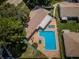 Aerial view of the community pool, showcasing its unique shape and well-kept surroundings at 2448 Enterprise Rd # 5, Clearwater, FL 33763