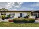 Relaxing patio featuring seating, plants, and a sliding door, great for enjoying outdoor living at 2448 Enterprise Rd # 5, Clearwater, FL 33763