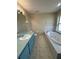 Bathroom has a large soaking tub with jets, a single vanity, and a toilet at 26348 Crooked Tree Ln, Brooksville, FL 34602