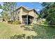 Exterior view of home with a screened-in lanai, showcasing the property's outdoor living space at 3019 Old Fulton Pl, Brandon, FL 33510