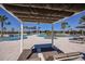 Relaxing poolside view with lounge chairs and sunshades, offering a tranquil escape under the open sky at 31191 Pendleton Landing Cir, Wesley Chapel, FL 33545