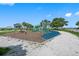 Community playground with modern play structures, walking path and covered pavilion in a park setting at 404 S Barbara Ln, Tampa, FL 33609