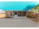 Covered patio with ample space for entertaining or relaxing outdoors at 408 Valencia Park Dr, Seffner, FL 33584