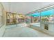 Screened patio area with view of the backyard at 408 Valencia Park Dr, Seffner, FL 33584