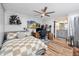 Bedroom with workspace, ensuite bathroom, and ample natural light at 455 Alt 19 S # 162, Palm Harbor, FL 34683