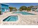 Resort-style community pool and spa offering a perfect oasis for relaxation and enjoyment at 455 Alt 19 S # 162, Palm Harbor, FL 34683