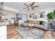 Inviting living room with stylish decor, a comfortable sofa, and wood flooring at 455 Alt 19 S # 162, Palm Harbor, FL 34683