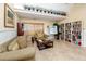 Cozy reading nook with comfortable seating, bookshelves, and natural light, ideal for relaxation at 455 Alt 19 S # 162, Palm Harbor, FL 34683