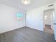This bright bedroom has gray flooring, closet and one window at 4716 Town N Country Blvd, Tampa, FL 33615