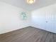 Bright bedroom showcases modern flooring and a clean, simple design at 4716 Town N Country Blvd, Tampa, FL 33615