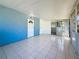 Bright sunroom with tile floors, light blue walls and sliding glass doors at 4716 Town N Country Blvd, Tampa, FL 33615