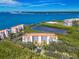 Stunning aerial view showcasing the building's prime location near the water at 4801 Osprey S Dr # 404, St Petersburg, FL 33711