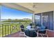 Balcony with a beautiful view of the water and lush greenery, perfect for relaxation at 4801 Osprey S Dr # 404, St Petersburg, FL 33711