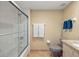 Bathroom features a shower with glass doors and a neutral color scheme at 4801 Osprey S Dr # 404, St Petersburg, FL 33711