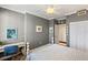 Comfortable bedroom with a cozy gray color, and a natural light view at 4801 Osprey S Dr # 404, St Petersburg, FL 33711