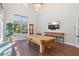 Billiard room with ample natural light and a modern TV for endless entertainment at 4801 Osprey S Dr # 404, St Petersburg, FL 33711