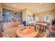 Community library with large bookshelves, tables, and chairs, creating a cozy and inviting space for reading at 4801 Osprey S Dr # 404, St Petersburg, FL 33711
