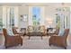 Relax in the elegant lobby featuring comfortable seating, natural light, and sophisticated decor at 4801 Osprey S Dr # 404, St Petersburg, FL 33711