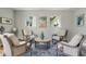 Cozy lobby featuring comfortable seating, a marble table and nautical decorations at 4801 Osprey S Dr # 404, St Petersburg, FL 33711