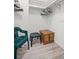 Well-organized walk-in closet with shelves, hanging rods, and ample storage space for clothes and accessories at 4900 Brittany S Dr # 205, St Petersburg, FL 33715