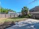 Fenced backyard with grass at 5807 N Miami Pl, Tampa, FL 33604