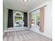 Bright bedroom features large windows, neutral paint, and plush carpeting, creating a peaceful atmosphere at 5807 N Miami Pl, Tampa, FL 33604