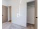 A cozy bedroom with a closet and modern door at 5807 N Miami Pl, Tampa, FL 33604