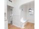 Bright dining nook boasts a built-in bench, modern lighting, and an open design with an adjacent room at 5807 N Miami Pl, Tampa, FL 33604
