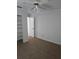 Bedroom features closet, neutral walls, and neutral carpeting at 6704 Hickorywood Ln # 2B, New Port Richey, FL 34653