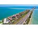 Scenic aerial of waterfront condominiums next to a highway with expansive ocean views at 7432 Sunshine Skyway S Ln # 502, St Petersburg, FL 33711