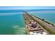 Stunning aerial view featuring waterfront condos along the bayside, near the highway at 7432 Sunshine Skyway S Ln # 602, St Petersburg, FL 33711