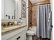 Comfortable bathroom featuring shower-tub, vanity, and neutral paint at 8307 Bluevine Sky Dr, Land O Lakes, FL 34637