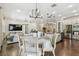 Inviting living space featuring a modern kitchen, dining area, and a comfortable living room at 8307 Bluevine Sky Dr, Land O Lakes, FL 34637