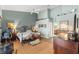 Spacious bedroom with a ceiling fan, wooden floors, and a decorative iron bed frame at 9339 Creole Ct, Weeki Wachee, FL 34613