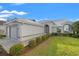 A charming home with a well-manicured lawn and an attached two-car garage at 9339 Creole Ct, Weeki Wachee, FL 34613