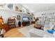 Comfortable living room boasts high ceilings, hardwood floors, and plenty of natural light at 9339 Creole Ct, Weeki Wachee, FL 34613