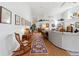 Open living area with high ceilings, wood floors, and stylish decor at 9339 Creole Ct, Weeki Wachee, FL 34613