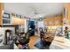 A fully equipped home office with built-in cabinets and multiple monitors at 9339 Creole Ct, Weeki Wachee, FL 34613