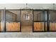 Interior of a horse stall featuring brick flooring and wood planking at 10101 Tarpon Springs Rd, Odessa, FL 33556