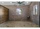Brick interior space with ample lighting and modern windows overlooking the property at 10101 Tarpon Springs Rd, Odessa, FL 33556