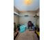A walk-in closet with white wire shelving, filled with a variety of items and personal belongings at 10603 1St St, Riverview, FL 33569