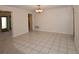 Dining area with tiled floor, chandelier, and views of other rooms, providing an open and inviting space for meals at 1108 Live Oak Ct, Clearwater, FL 33756