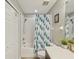 Bright bathroom featuring a shower and tub, modern vanity, and neutral color palette at 11641 Crowned Sparrow Ln, Tampa, FL 33626
