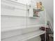 A walk-in pantry closet with lots of storage and shelving at 11641 Crowned Sparrow Ln, Tampa, FL 33626