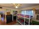 Functional ' bedroom with a bunk bed, dresser, and closet space at 11711 Raintree Village Blvd # C, Temple Terrace, FL 33617