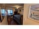 This bedroom features a ceiling fan, natural light and an attached balcony at 11711 Raintree Village Blvd # C, Temple Terrace, FL 33617