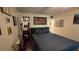Cozy bedroom with a large bed, hardwood floors and closet at 11711 Raintree Village Blvd # C, Temple Terrace, FL 33617
