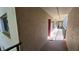 Exterior hallway with direct access to the unit, and secure doors at 11711 Raintree Village Blvd # C, Temple Terrace, FL 33617