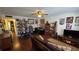 An inviting living area with cozy decor, ceiling fan, and ample natural light at 11711 Raintree Village Blvd # C, Temple Terrace, FL 33617